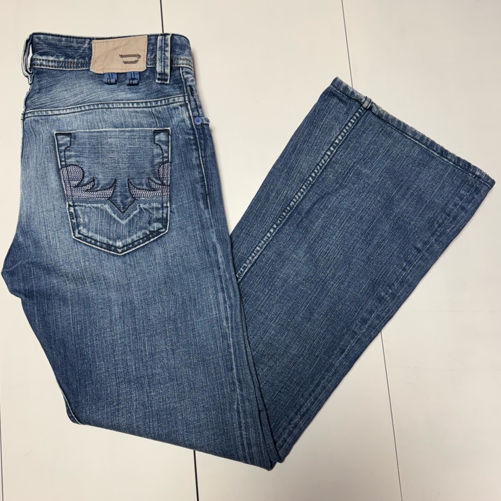 Vintage Diesel Men's Bootcut Jeans .
see photos . Length has been shortened